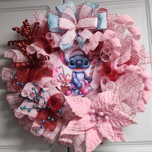 Stitch Pink Holiday Wreath With Pink Poinsettia